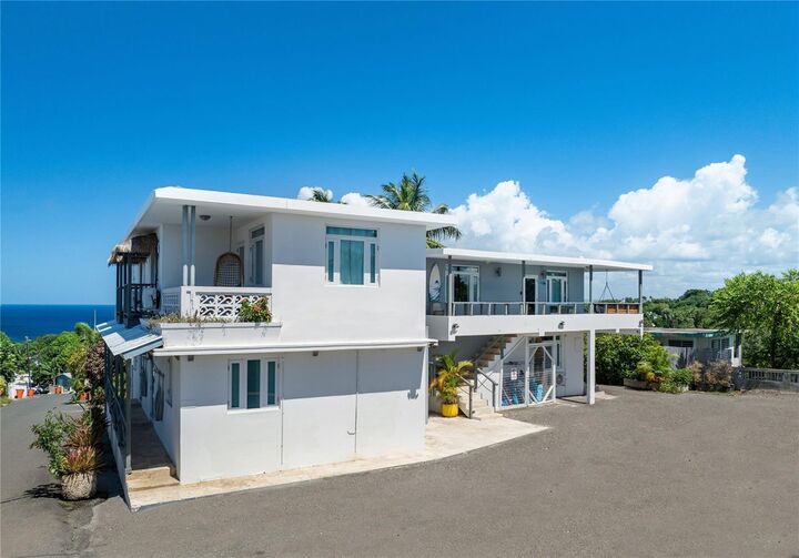 Property Photo:  Carr. 413 Int. Km 3.2 Rincon Surf Club  PR 00677 