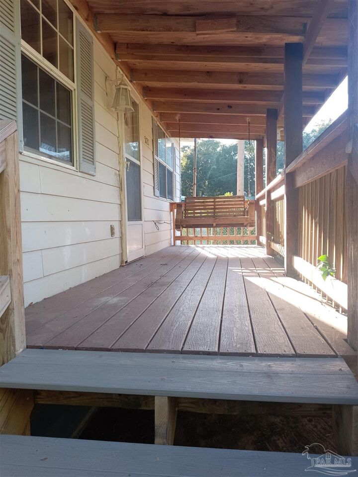 Property Photo: 5721 Pine Dr FL 32583