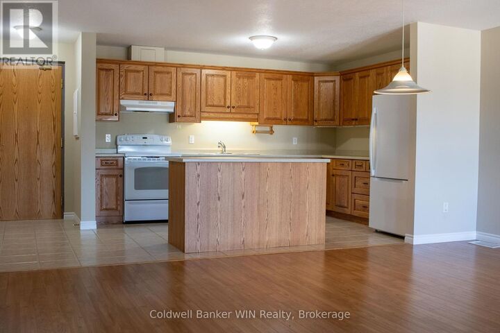 Property Photo:  401 Birmingham Street East 211  ON N0G 2L2 