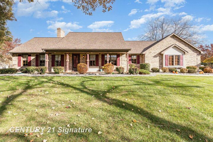 Property Photo:  8440 N Gleaner Road  MI 48623 