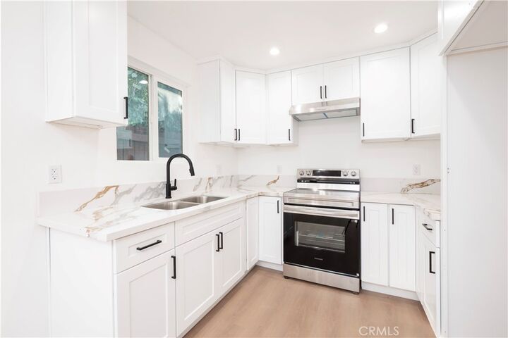 Property Photo:  5741 S St Andrews Place 1/2  CA 90062 