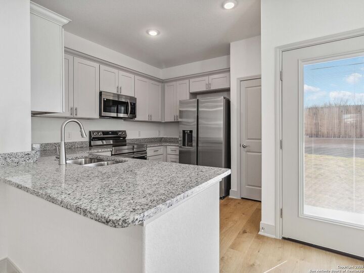 Property Photo: 10203 Tulipwood Run 102 TX 78252