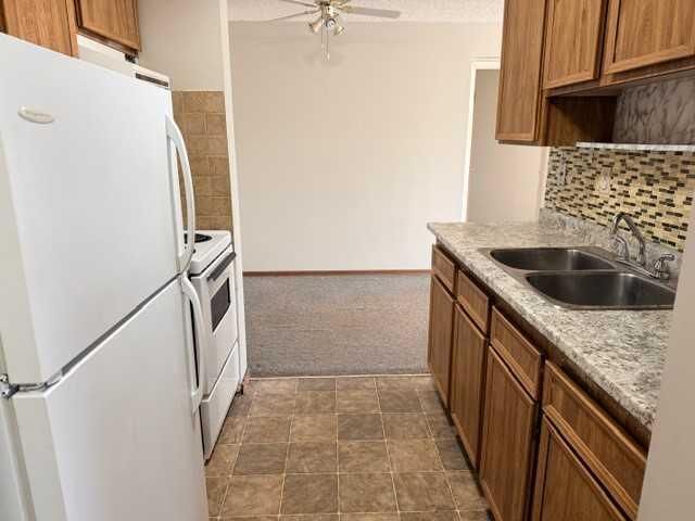 Property Photo: 27 Bennett Street 103 AB T4R 1V3