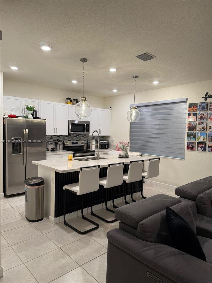 Property Photo: 10009 W 32nd Ln FL 33018