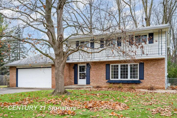Property Photo:  7860 Luann Street  MI 48609 