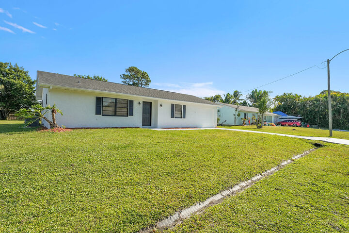 Property Photo: 2251 SE Holland Street FL 34952