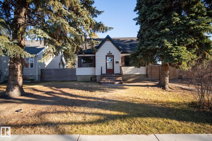 Property Photo:  10965 139 Street NW  AB T5M 1R3 