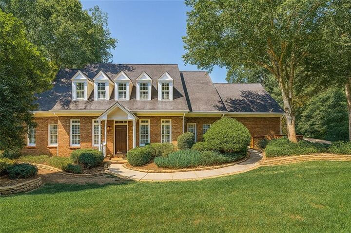 Property Photo:  4070 Runnymede Drive SW  GA 30047 