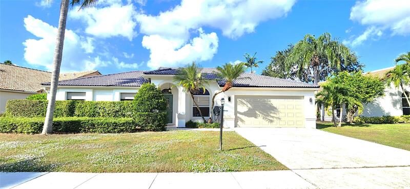 Property Photo: 12606 White Coral Dr FL 33414