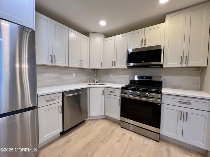 Property Photo:  7 Seattle Court 5  NJ 07728 