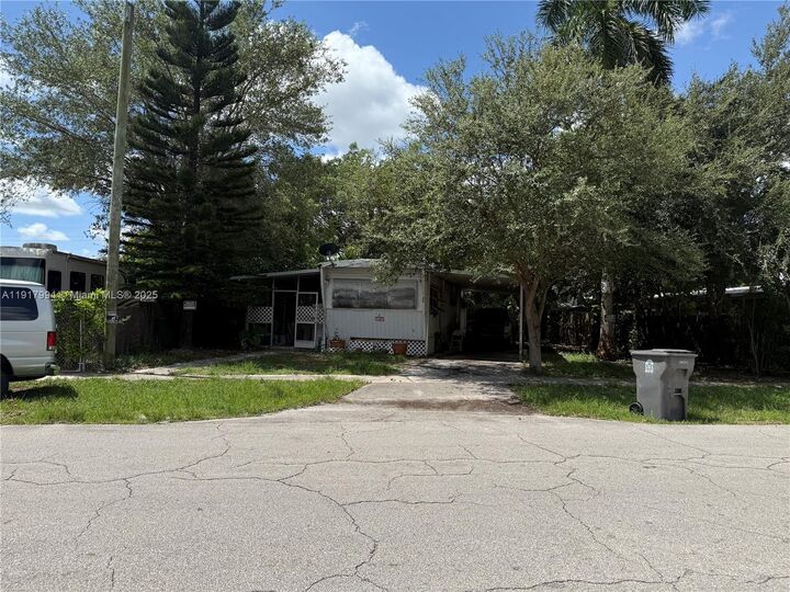 Property Photo:  5964 Tiffany Pl  FL 33417 