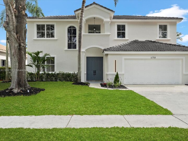 Property Photo:  6758 Lake Nona Pl  FL 33463 