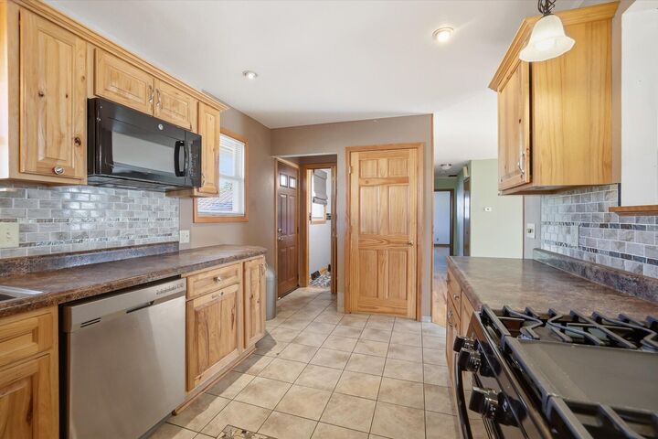 Property Photo: 9320 W Howard Ave WI 53228