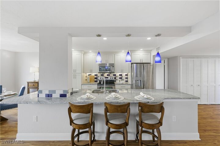 Property Photo: 11 Bluebill Avenue 201 FL 34108