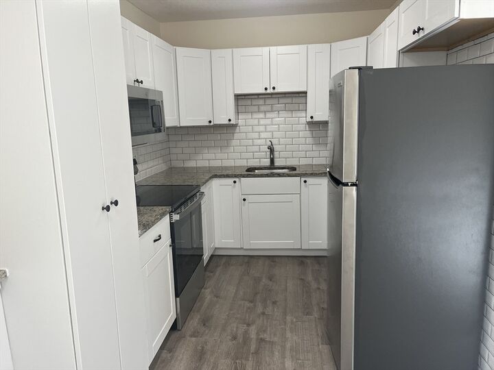 Property Photo: 221 Rock St F1 MA 02062