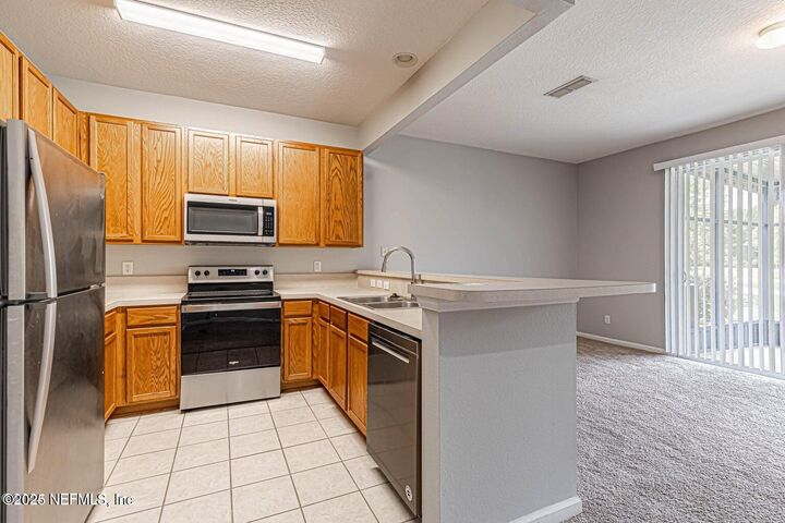 Property Photo:  5784 Sandstone Way  FL 32258 