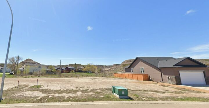 Property Photo:  189 10 Avenue SE  AB T0J 0Y6 