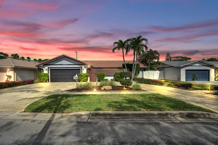 Property Photo:  809 SE 13th Court  FL 33441 