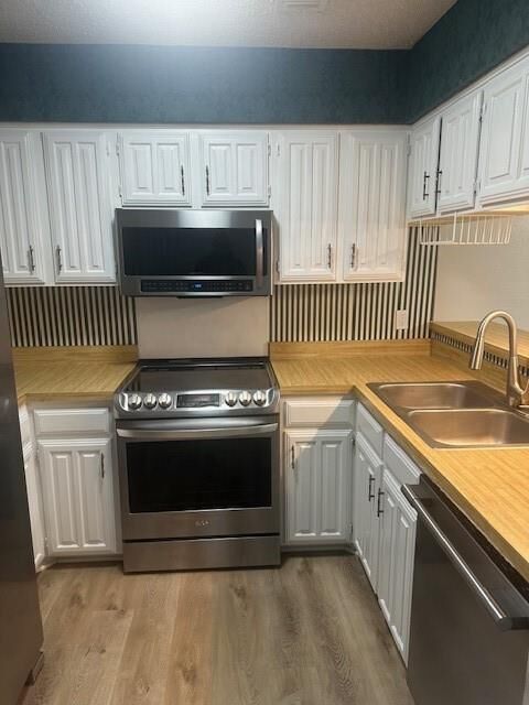 Property Photo: 5626 Preston Oaks Road 27B TX 75254