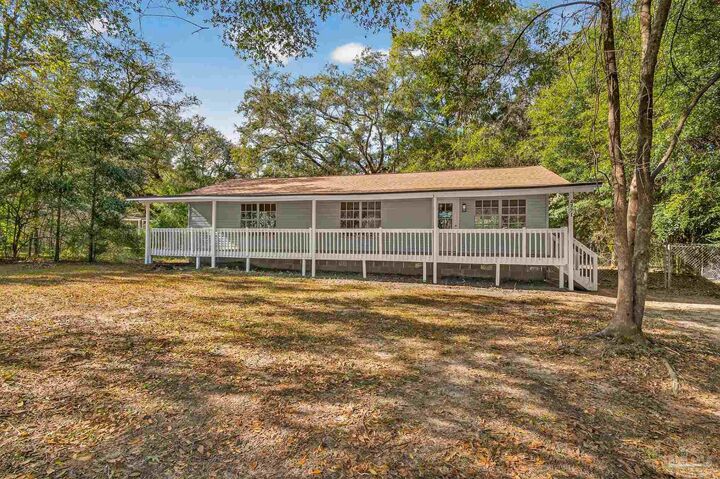 Property Photo: 4771 Carl Booker Rd FL 32583