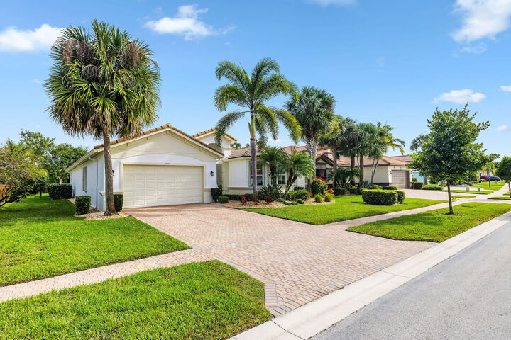Property Photo: 9362 Isles Cay Drive FL 33446
