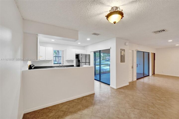 Property Photo:  9340 SW 61st Way B  FL 33428 