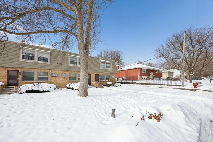 Property Photo: 1494 21st Avenue NW 4 MN 55112