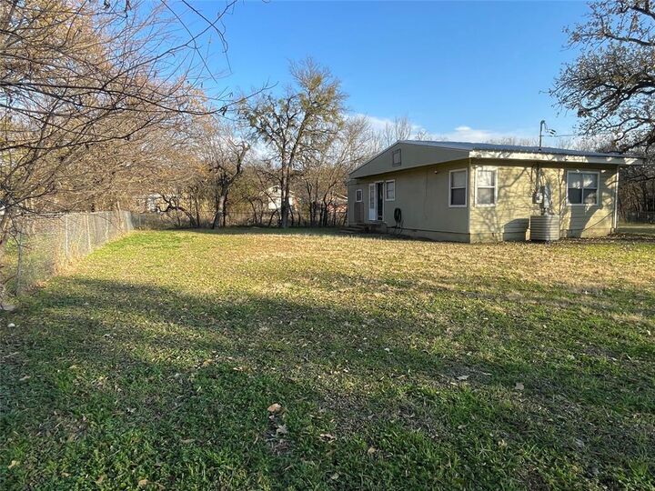 Property Photo:  300 NW 13th Street  TX 76067 