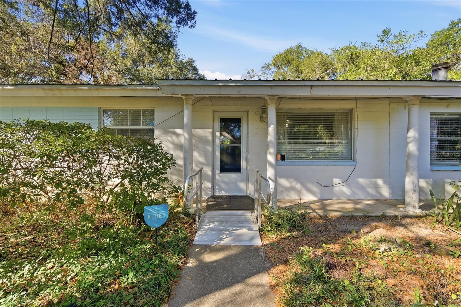 Property Photo:  202 SE 49th Drive  FL 32641 