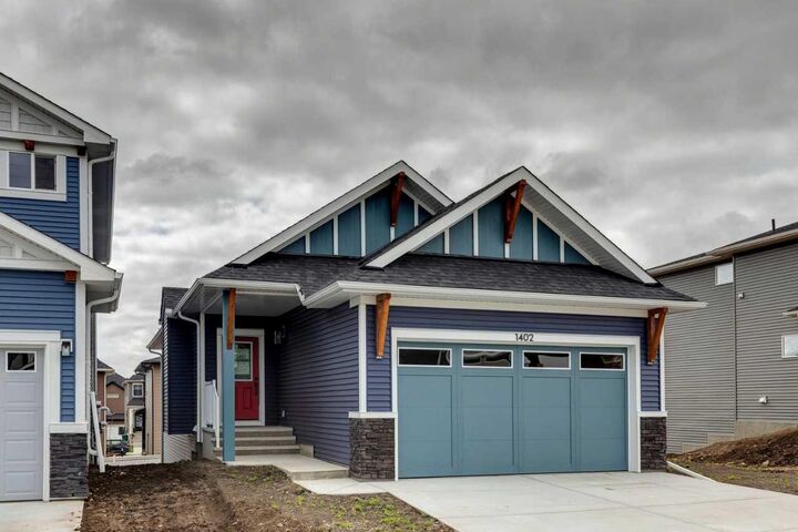 Property Photo: 1402 Bayview Crescent SW AB T4B 5N9