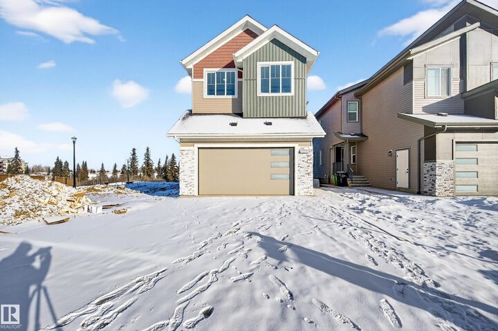 Property Photo:  2020 Collip Crescent SW  AB T6W 4W9 