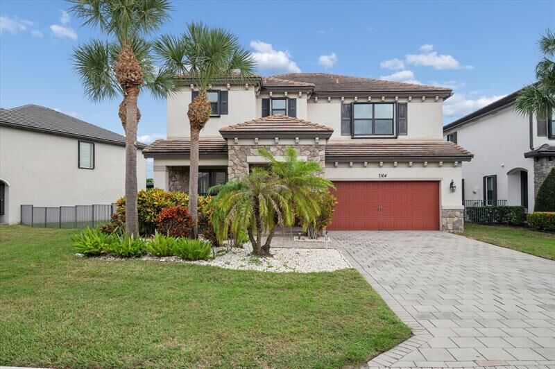 Property Photo:  7164 Sandgrace Ln  FL 33463 