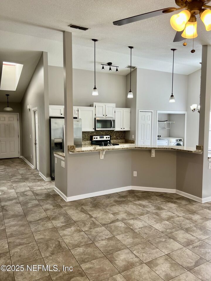 Property Photo:  7820 Collins Ridge Boulevard E  FL 32244 