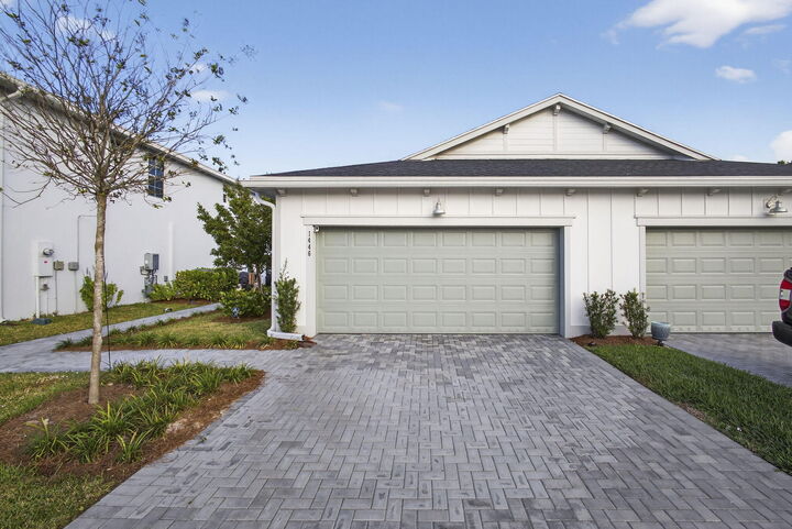 Property Photo:  1446 Tangled Orchard Trace  FL 33470 