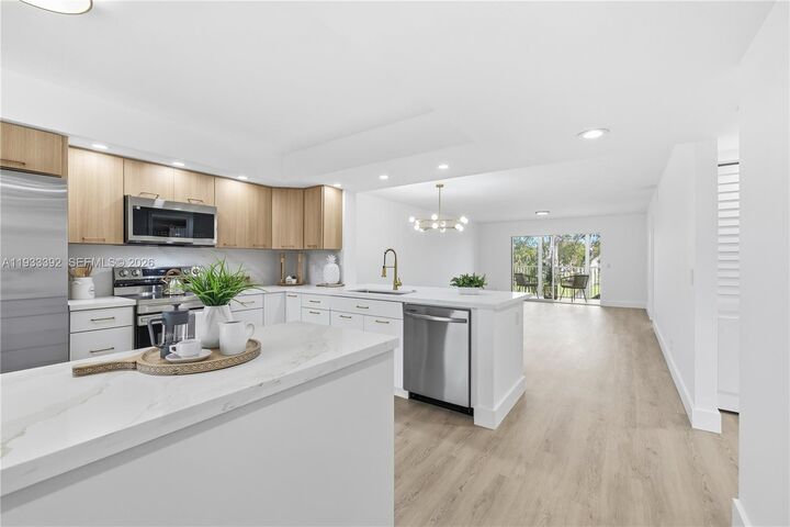 Property Photo:  1101 SW 128th Ter 313C  FL 33027 