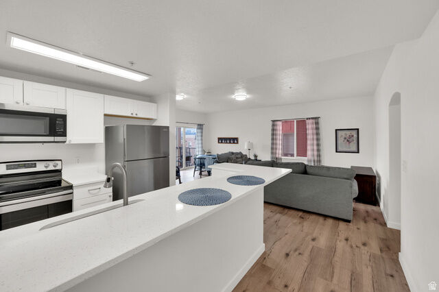 Property Photo:  165 W Albion Village Way 202  UT 84070 