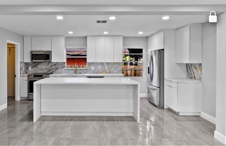 Property Photo:  800 NW 6th Ave  FL 33060 