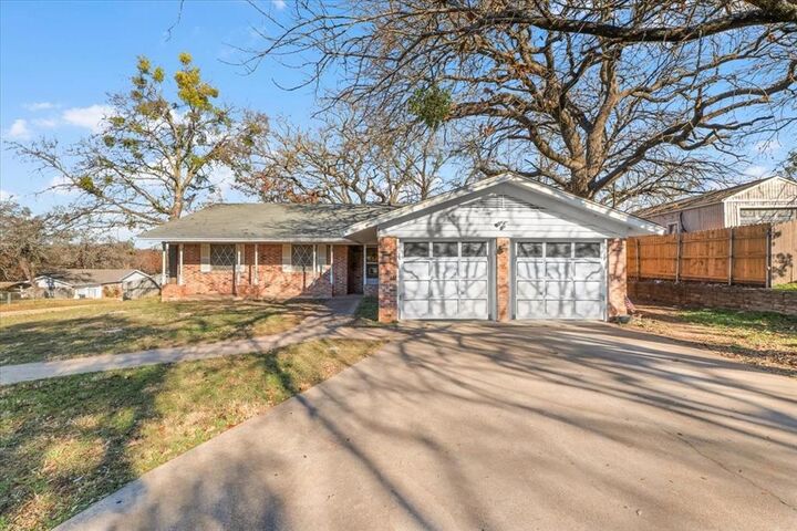 Property Photo:  601 State Street  TX 76086 