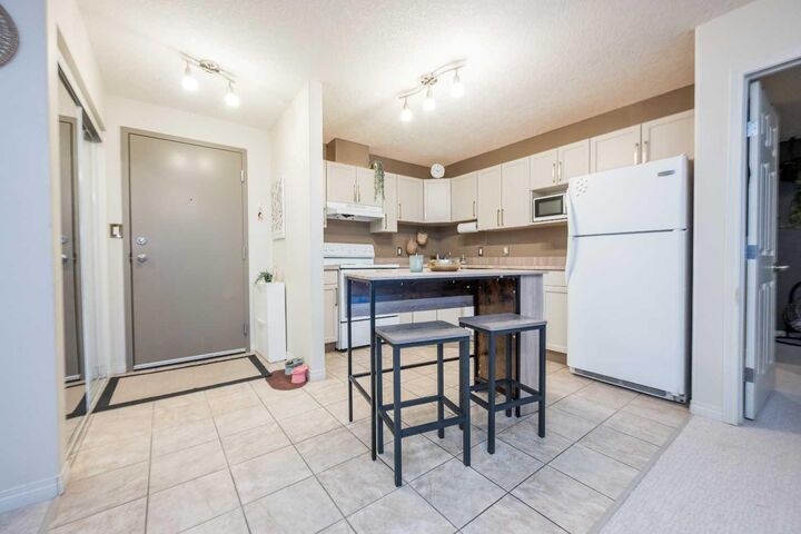 Property Photo:  9810 96 Street 114  AB T8V 0R5 