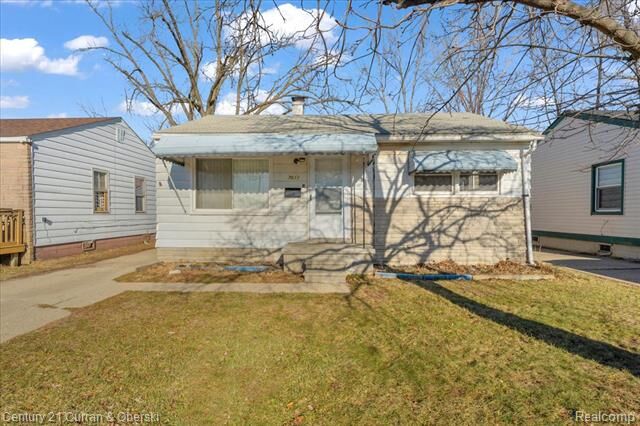 Property Photo:  7011 Lozier Avenue  MI 48091 