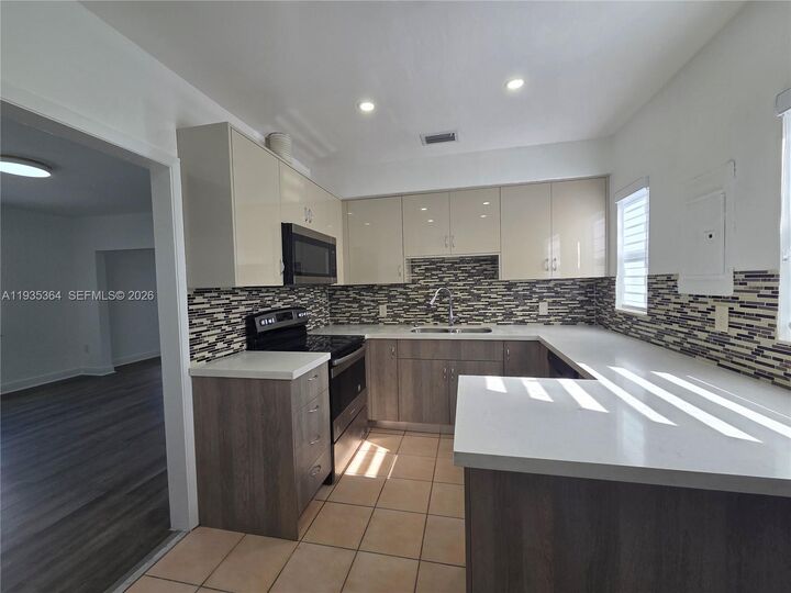 Property Photo:  6240 SW 21st St (Upstairs) 6242  FL 33155 