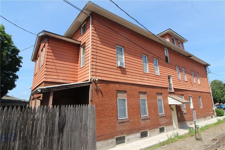 Property Photo:  114 Freeman Avenue  NY 13209 