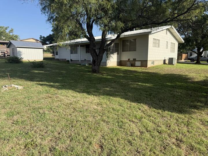 Property Photo:  303 Walnut St  TX 78624 