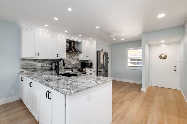 Property Photo:  4860 Gulf Of Mexico Drive Villa 13  FL 34228 