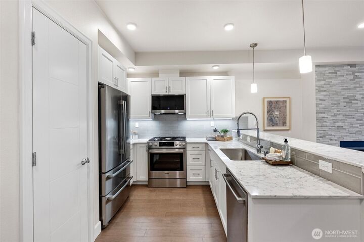 Property Photo:  4961  Main Street 814  WA 98407 