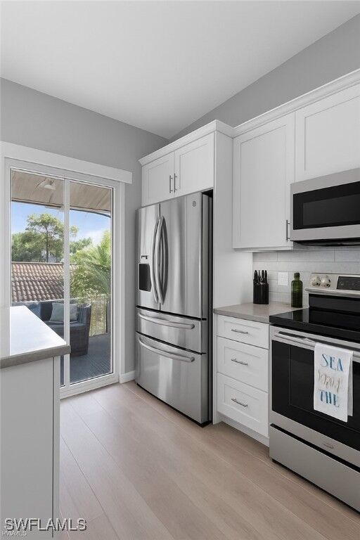 Property Photo: 1635 Windy Pines Drive 2408 FL 34112