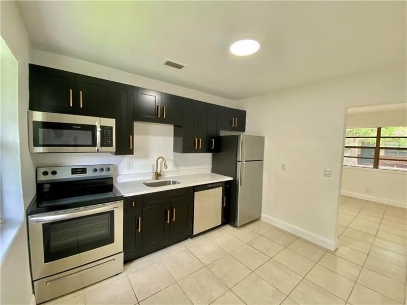 Property Photo: 721 NW 1st Ct FL 33009