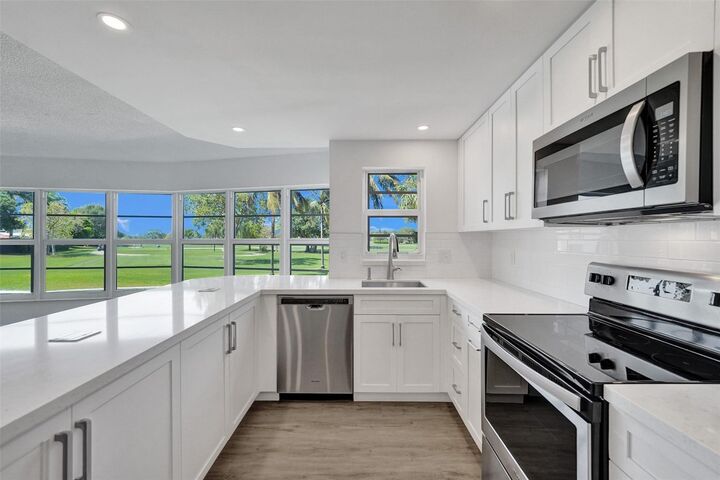 Property Photo:  2500 NE 48th Lane 103  FL 33308 