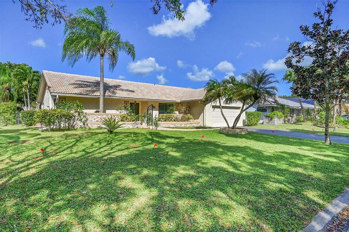 Property Photo:  11001 NW 13th Court  FL 33071 