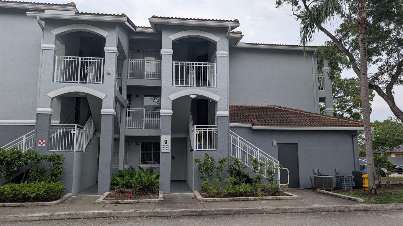 Property Photo:  150 NW 96th Avenue 9-101  FL 33024 